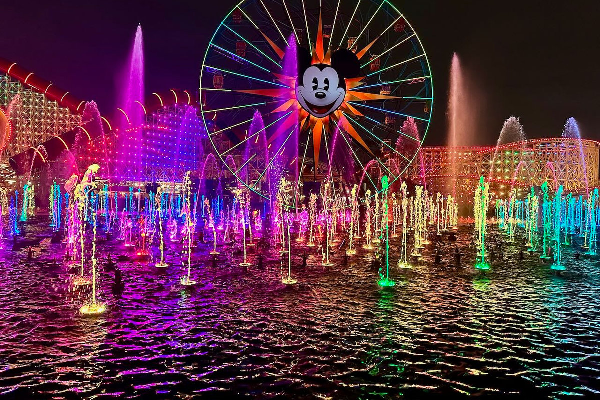 Pixar Pier lit up at night during World of Color at Disney California Adventure